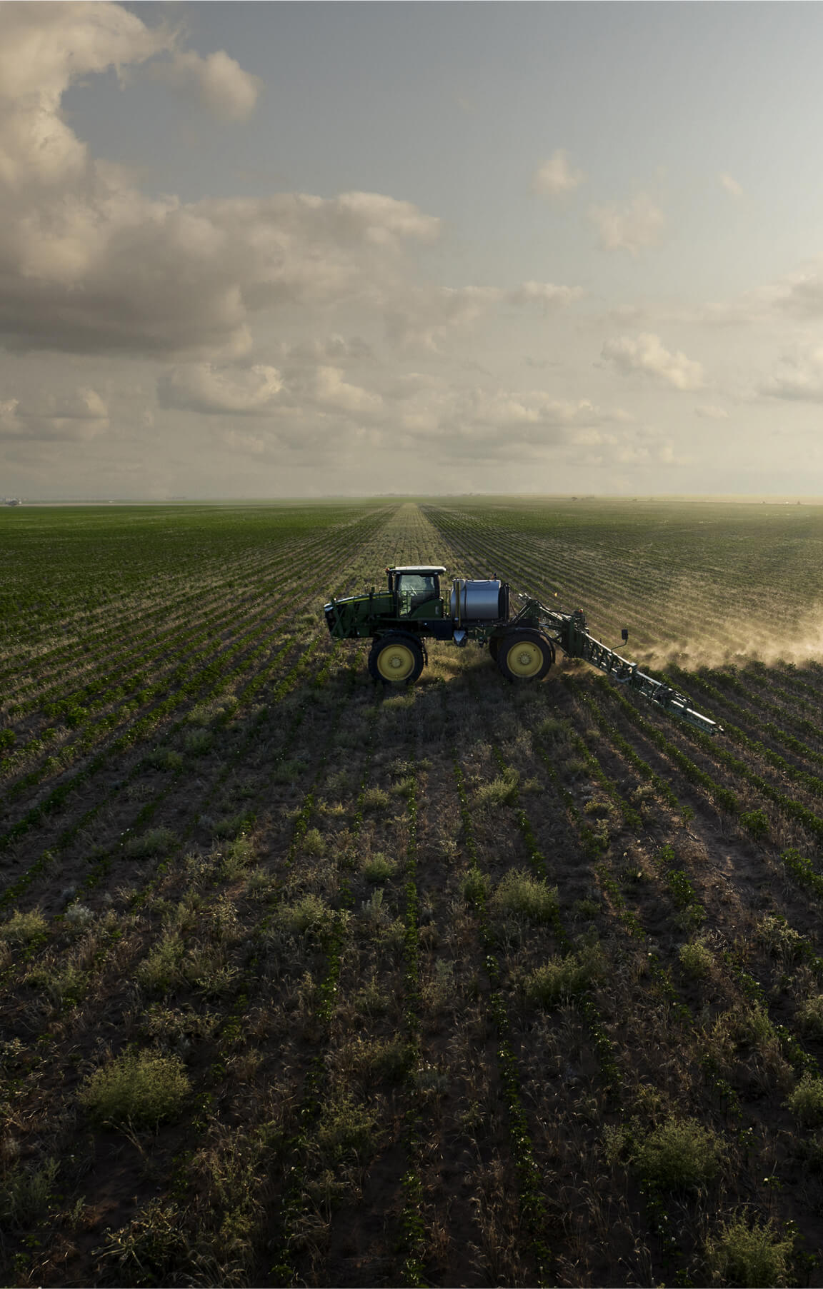 Farm equipment in large field